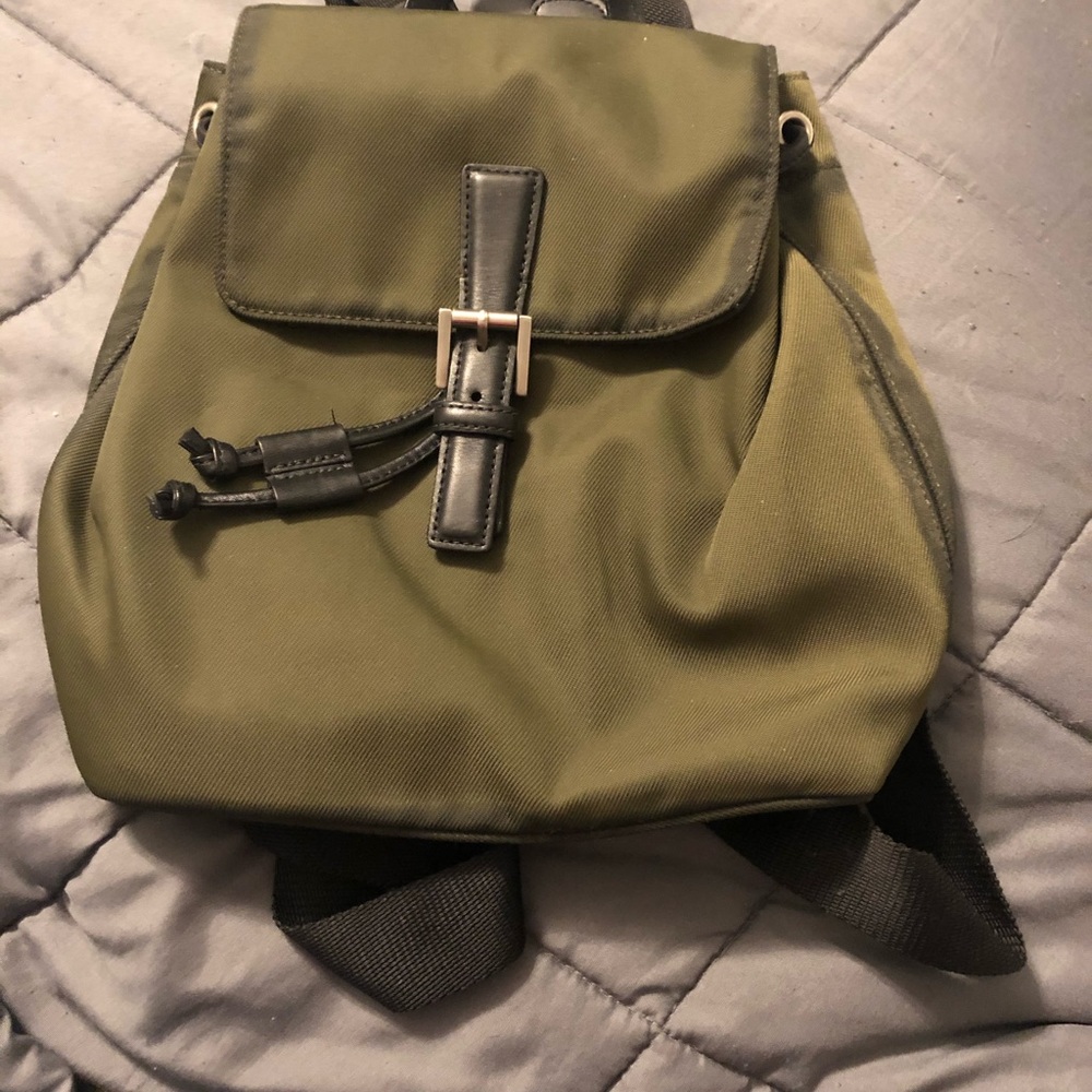 Green coach bag back
